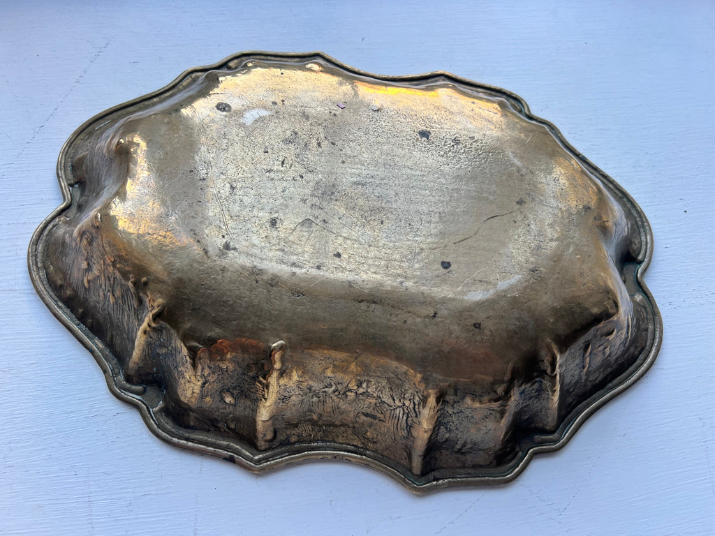 A heavy brass lobe shaped dish with incised initials & date 1700